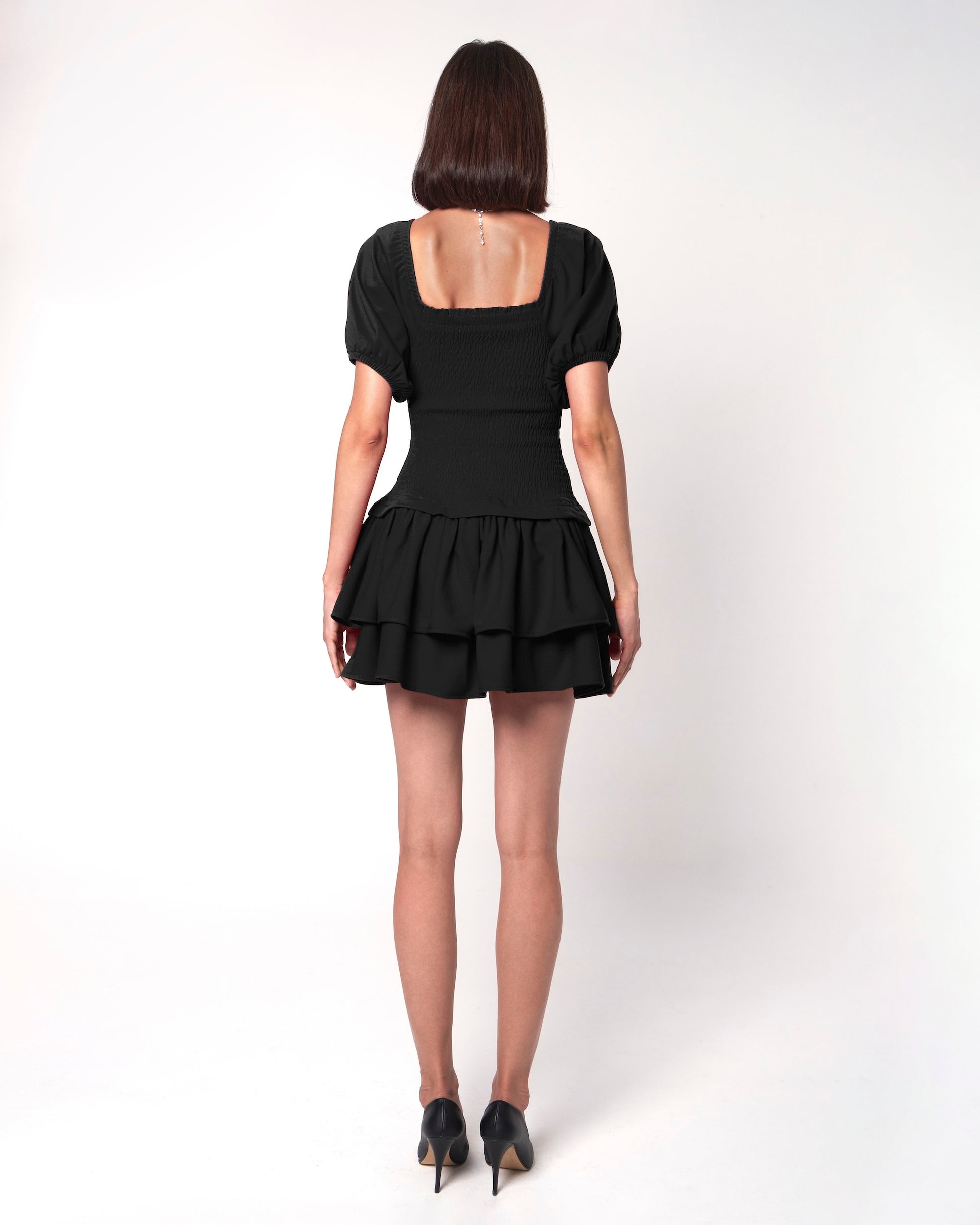 Lady in Black Mini Dress - ALIVE New York City